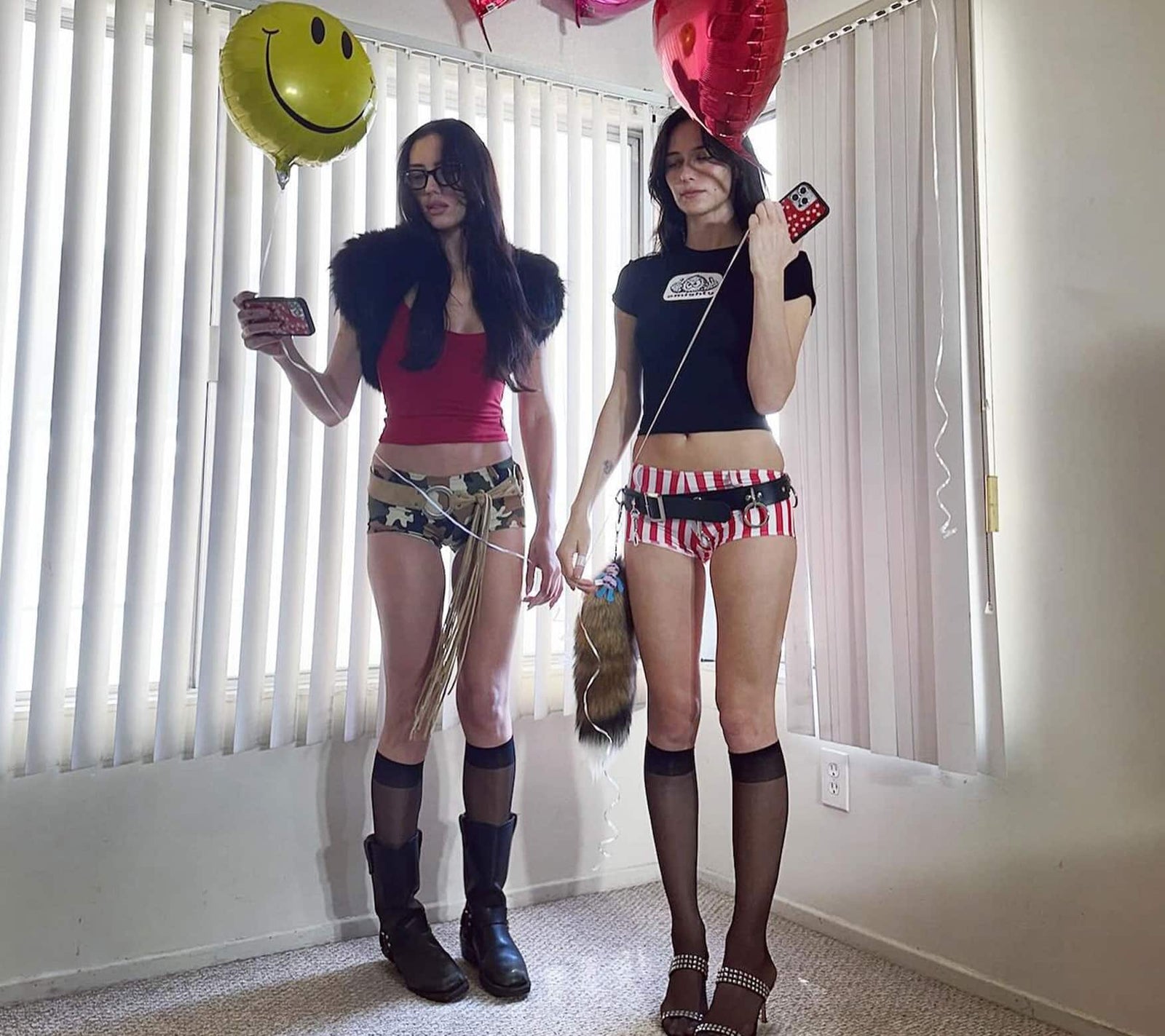Devon and Sydney Carlson wear micro shorts and baby tees