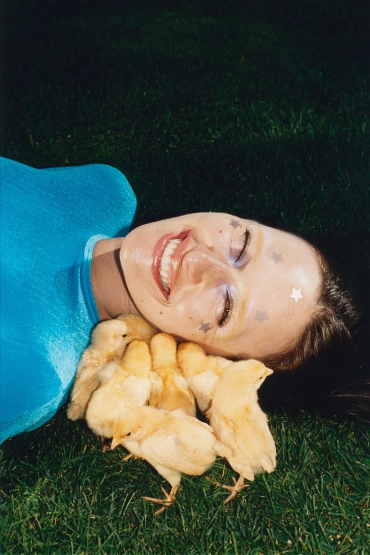 Devon Lee Carlson poses with baby chicks and Starface patches