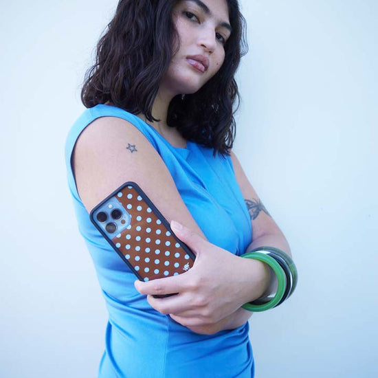 Lifestyle Image 01 Brown and Blue Polka Dots Samsung Galaxy Case