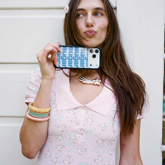 Lifestyle Image 02 Ashley Williams Sugar Packet iPhone Case