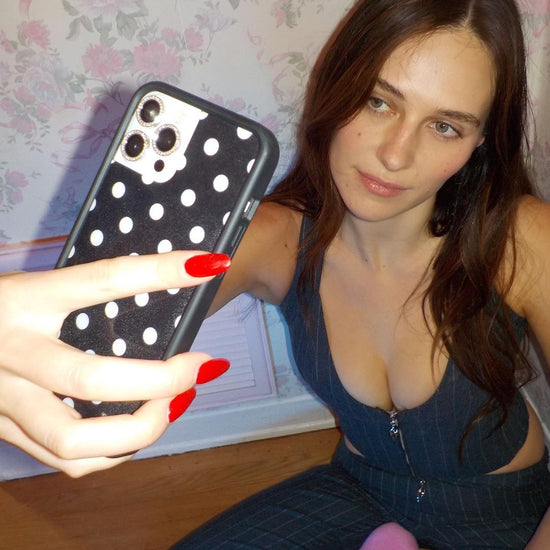 Lifestyle Image 02 Black and White Polka Dot iPhone Case