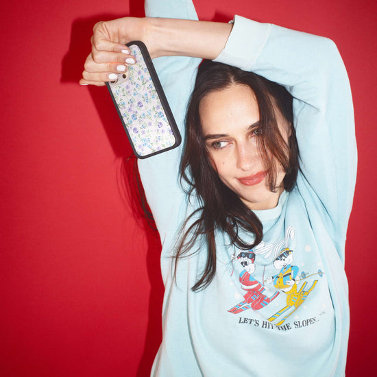 Lifestyle Image 02 Lilac and Blue Floral iPhone Case