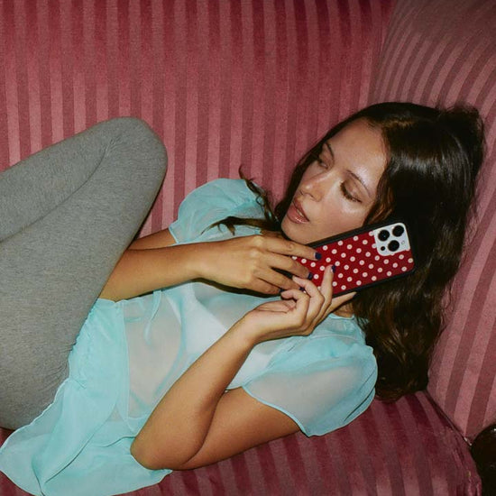 Lifestyle Image 02 Polka Dot Burgundy and Cream iPhone Case