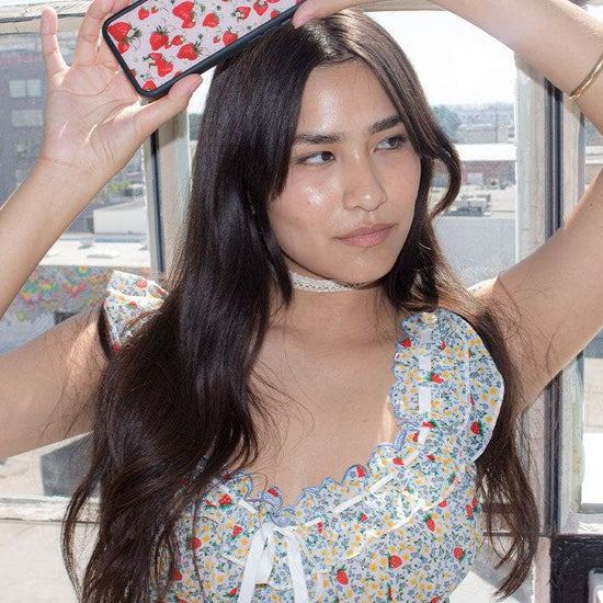 Lifestyle Image 02 Strawberry Fields iPhone Case 