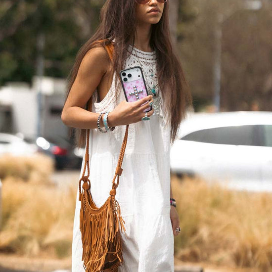 Lifestyle Image 02 Stud Cross Forget Me Not Floral Pink iPhone Case