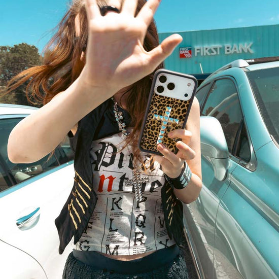 Lifestyle Image 02 Stud Cross Meow iPhone Case