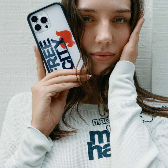 Lifestyle Image 02 THE MADHAPPY AND FREECITY TOGETHERFOREVER WHITE AND NAVY iPhone Case