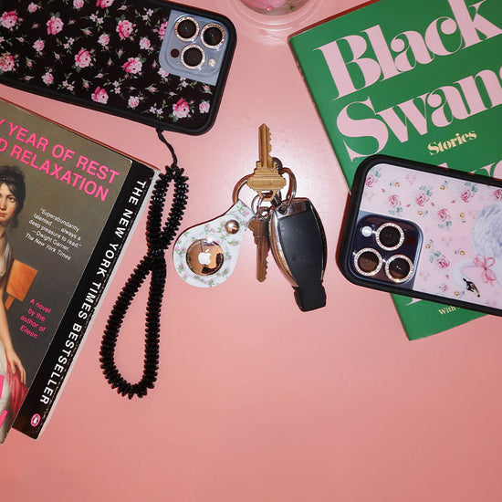 pink posie AirTag keychain